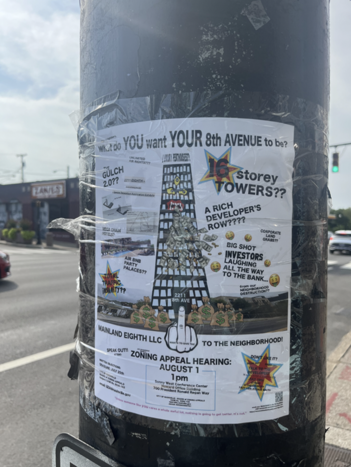 A flyer posted on a telephone pole near the site of a potential Eighth Avenue development
